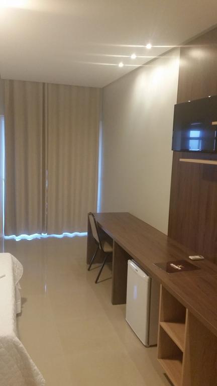 Kamur Plaza Hotel Гоянезія Номер фото